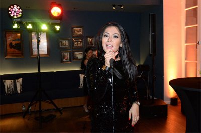 Company anniversary supporting programme singer TEST